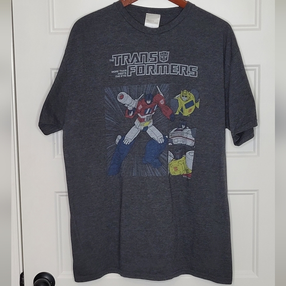 Transformers More Than Meets The Eye Autobots XL T-Shirt - Picture 1 of 6
